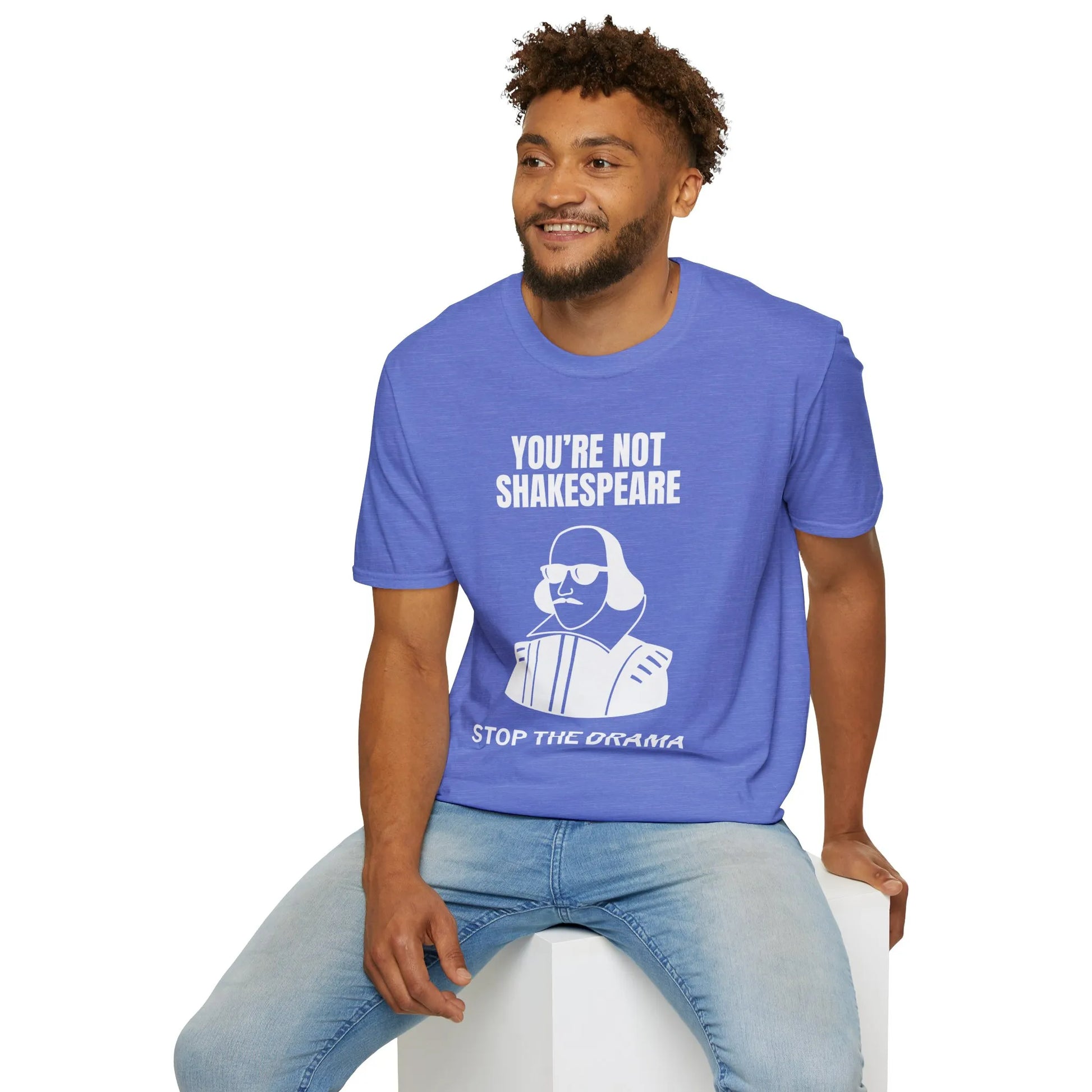 Funny 'You're Not Shakespeare' tee featuring a quirky illustration of Shakespeare urging to 'Stop the Drama.' Perfect for book lovers.
