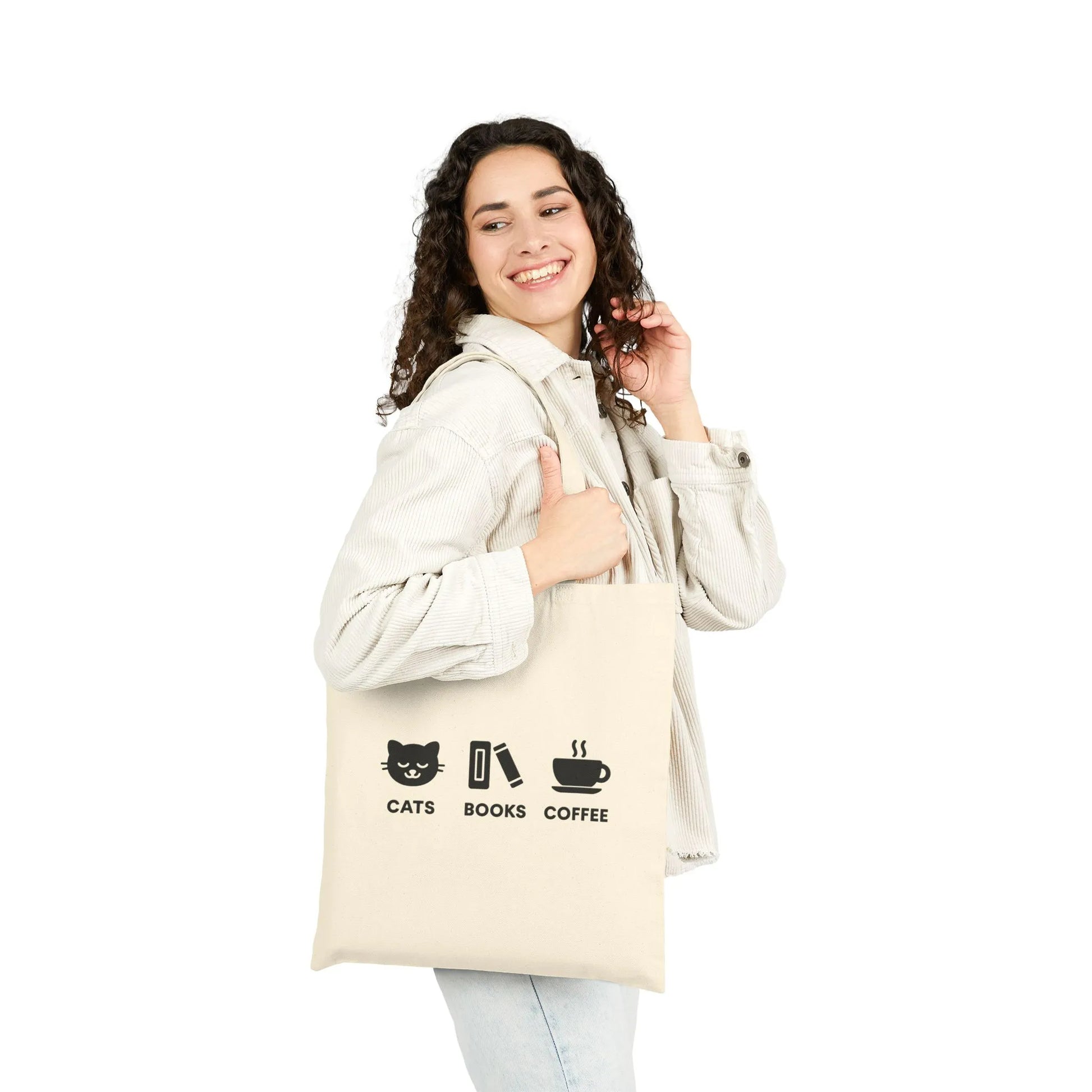 Holy Trinity Tote Bag featuring cats, books, and coffee icons, perfect for book lovers and cozy-life enthusiasts.