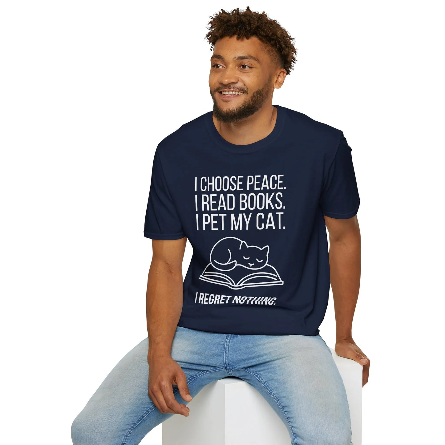 Funny book lover shirt featuring a cat on a book with text: 'I choose peace. I read books. I pet my cat. I regret nothing.'