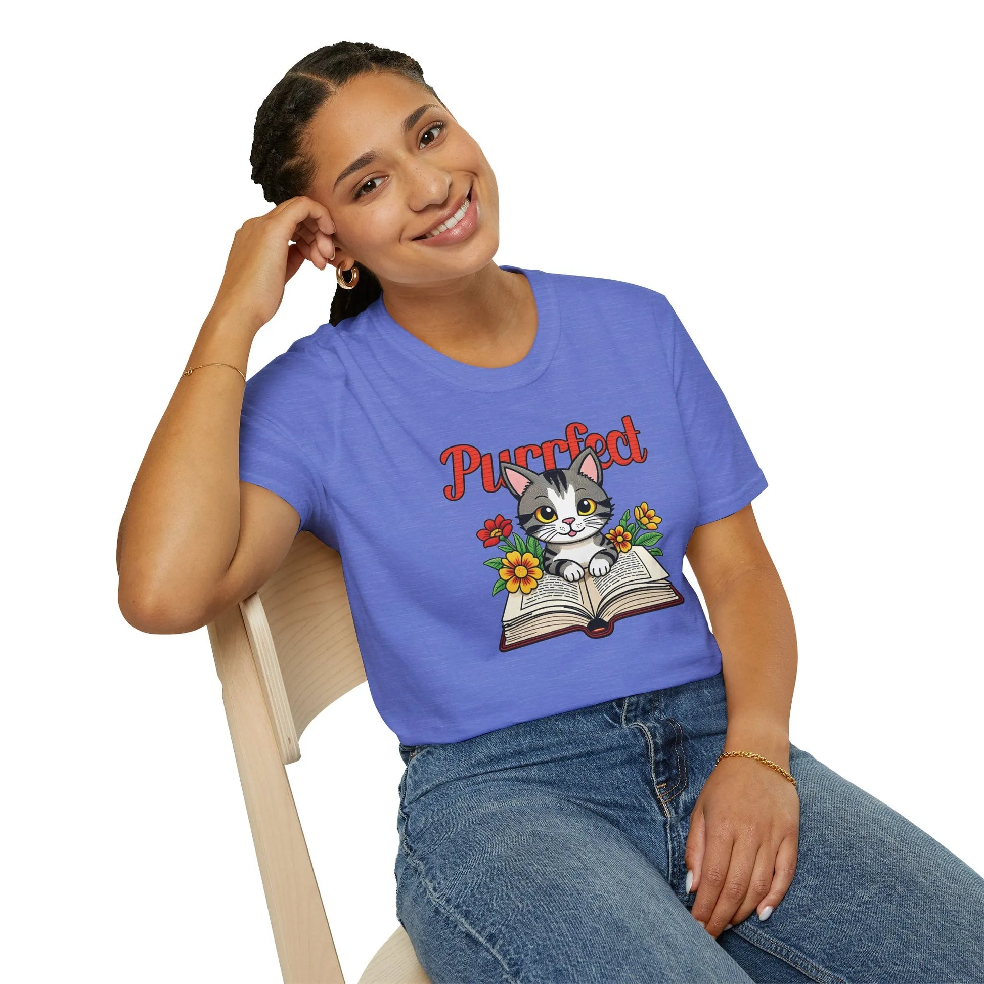 Cozy Purrfect Page T-Shirt featuring a kitten on an open book with flowers, a delightful gift for cat-loving bookworms.