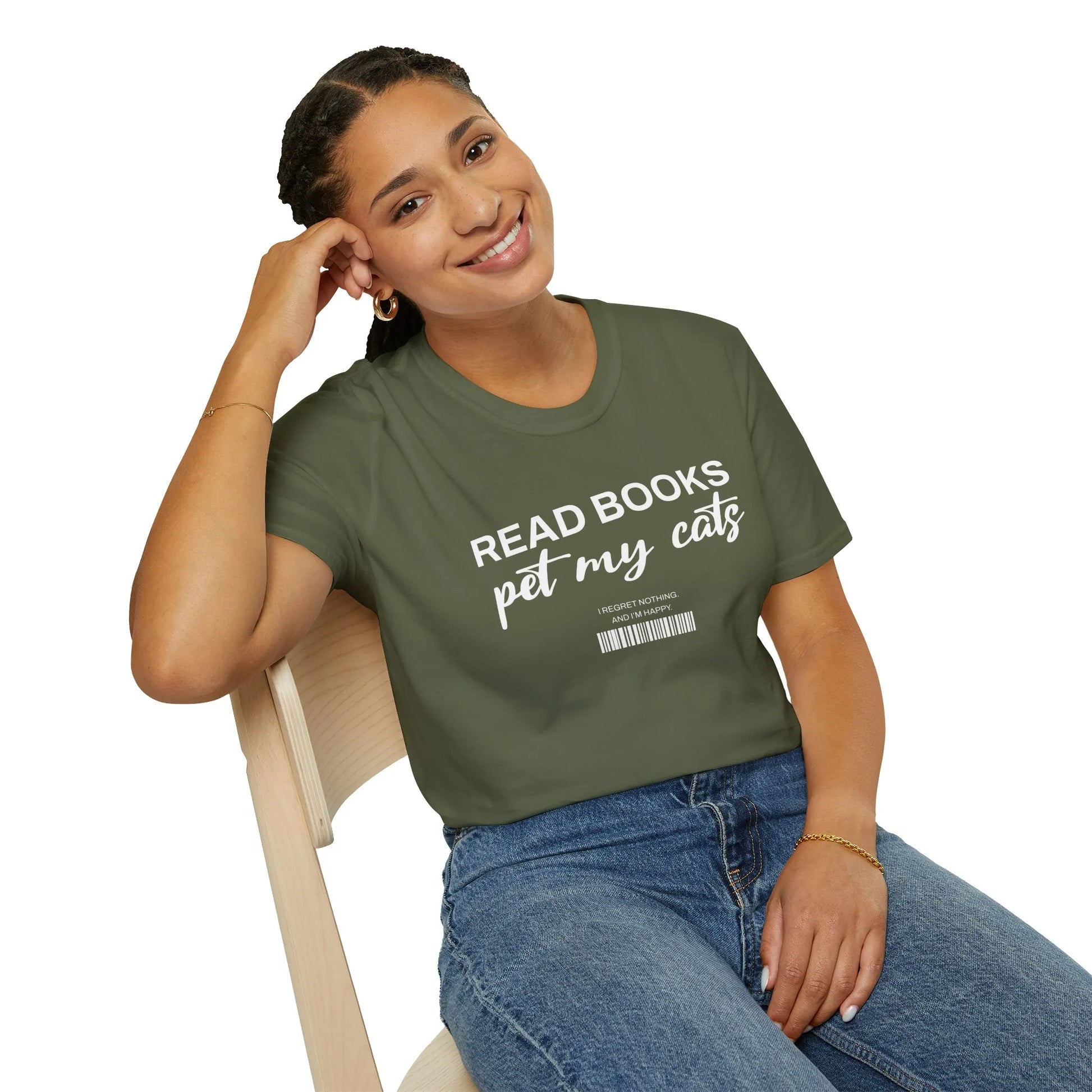 A smiling woman in a green Barcode Reader T-Shirt with the text 'READ BOOKS pet my cats' and a quirky barcode design.
