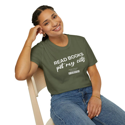 A smiling woman in a green Barcode Reader T-Shirt with the text 'READ BOOKS pet my cats' and a quirky barcode design.