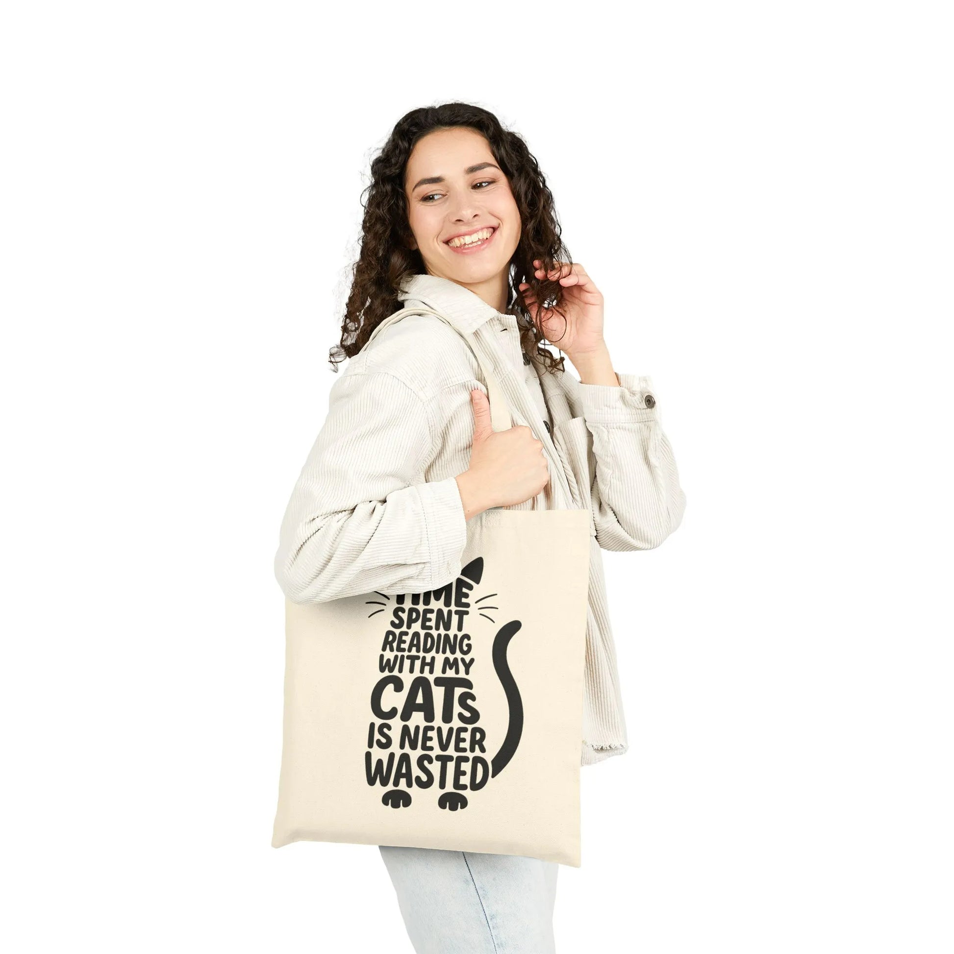 Charming "Never Wasted with Cats Tote Bag" featuring playful cat typography, perfect for book lovers who enjoy reading with their feline friends.