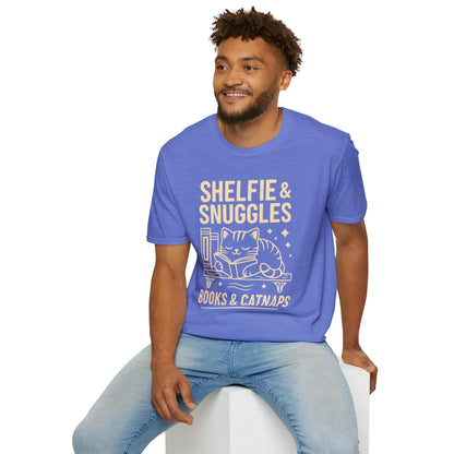 Book lover shirt featuring a cat napping beside books with 'Shelfie & Snuggles' text—perfect for cozy readers!