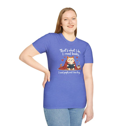 A cozy blue t-shirt featuring a humorous illustration of a cat reading, saying: 'That's what I do, I read books, I avoid people, and I love hugs.'