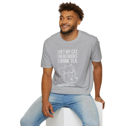 Cozy unisex tee featuring a cat with text: 'I pet my cat. I read books. I drink tea.' Perfect for book lovers.