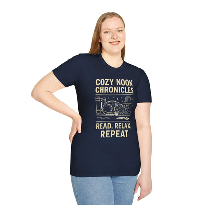 Cozy Nook Chronicles T-Shirt featuring a sleepy cat by books, perfect for book lovers who enjoy humor and relaxation.
