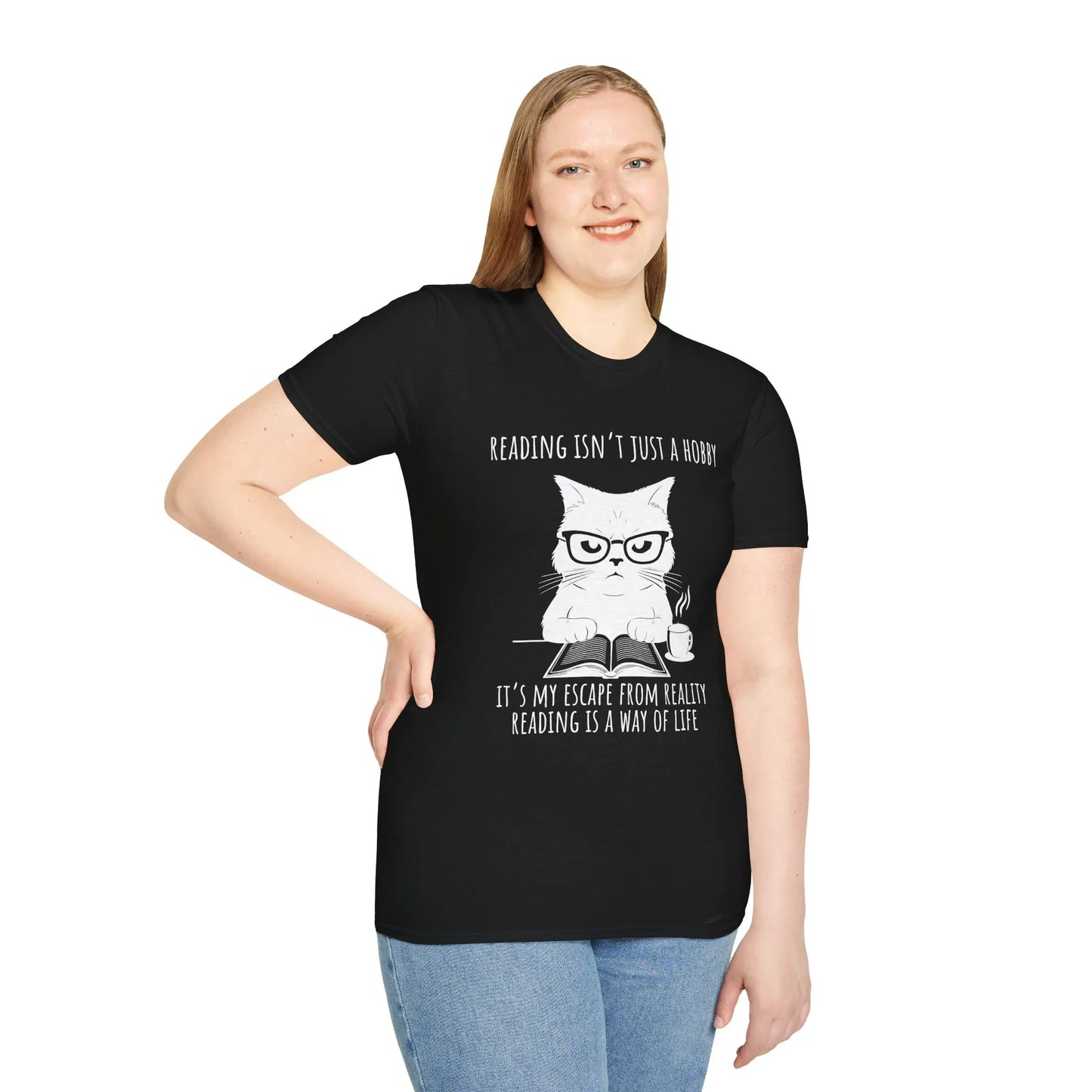 Funny reading tee with a grumpy cat in glasses holding a book, text reads 'Reading isn't just a hobby, it's my escape from reality.'