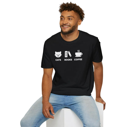 A relaxed fit Holy Trinity T-Shirt featuring minimalist icons of a cat, books, and coffee, ideal for book lovers and cozy reading moments.