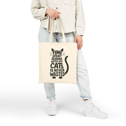Introducing the Never Wasted with Cats Tote Bag, featuring playful cat typography and the quote 'Time Spent Reading with My Cats is Never Wasted'. Perfect for book lovers and cat enthusiasts!
