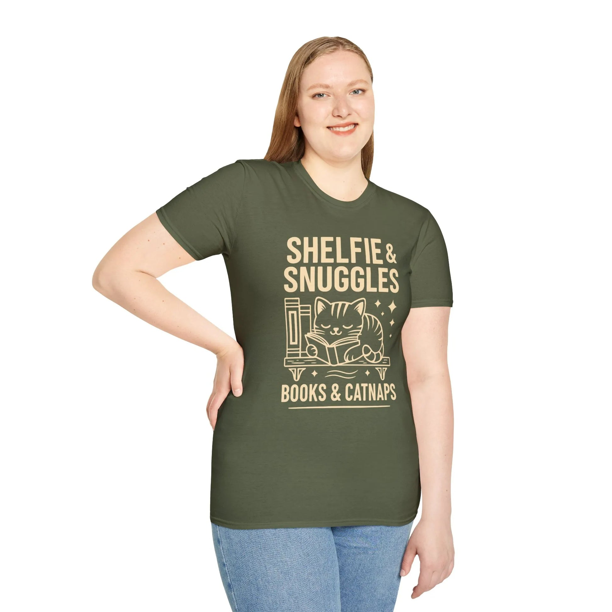 Cozy green t-shirt with "Shelfie & Snuggles" text and a cute cat beside books, perfect for book lovers and cat enthusiasts.