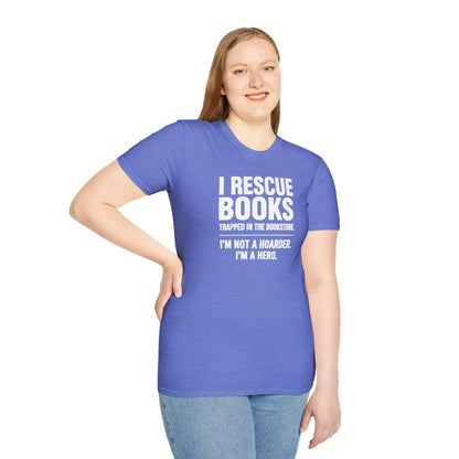 Smiling book lover in a cozy environment, wearing a relaxed fit 'Not a Hoarder T-Shirt', surrounded by books, embodying a reading lifestyle.