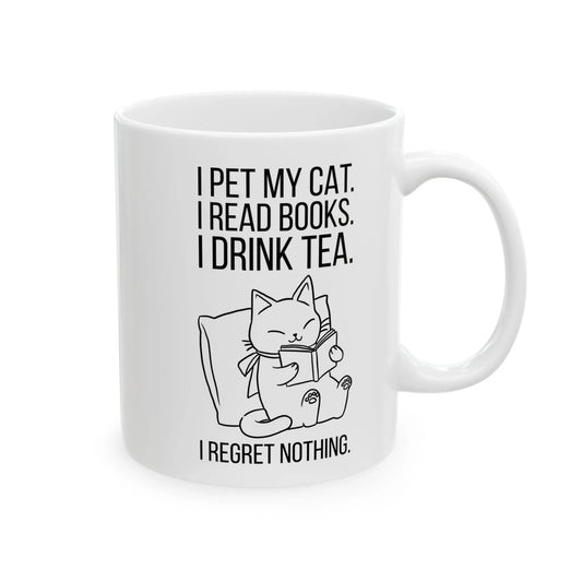 Purrfect Tea & Tales Mug featuring a cozy kitty with text: 'I pet my cat. I read books. I drink tea. I regret nothing.'