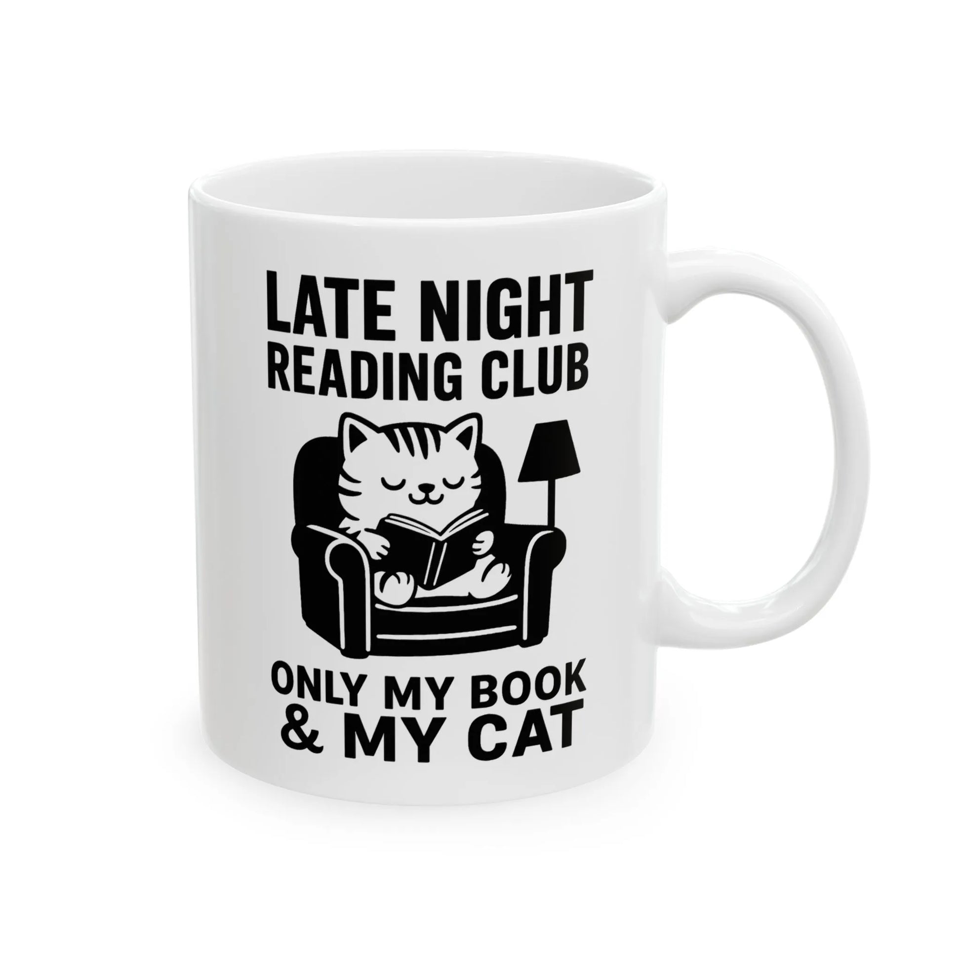 Late Night Reading Club Mug featuring a cozy cat reading in a chair, perfect for cat lovers and bookworms.