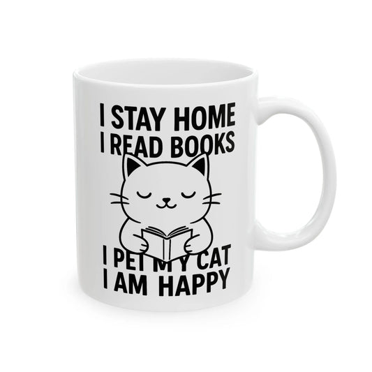 Happy Cat Reader Mug featuring a cute cat reading a book with text saying "I STAY HOME I READ BOOKS I PET MY CAT I AM HAPPY." Perfect gift for book lovers!