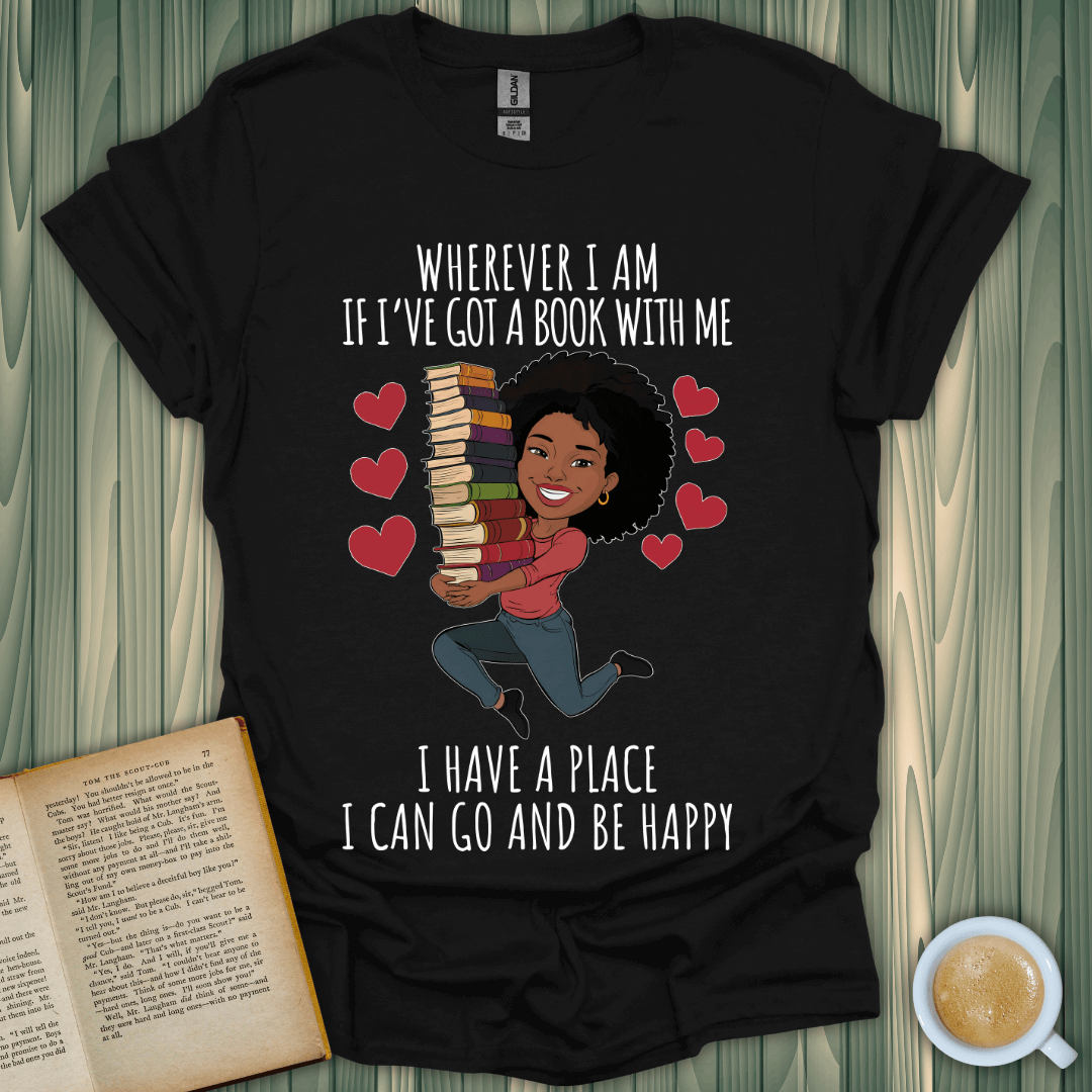 Book lover t-shirt featuring a joyful graphic of a woman with books, black color, perfect for book enthusiasts.