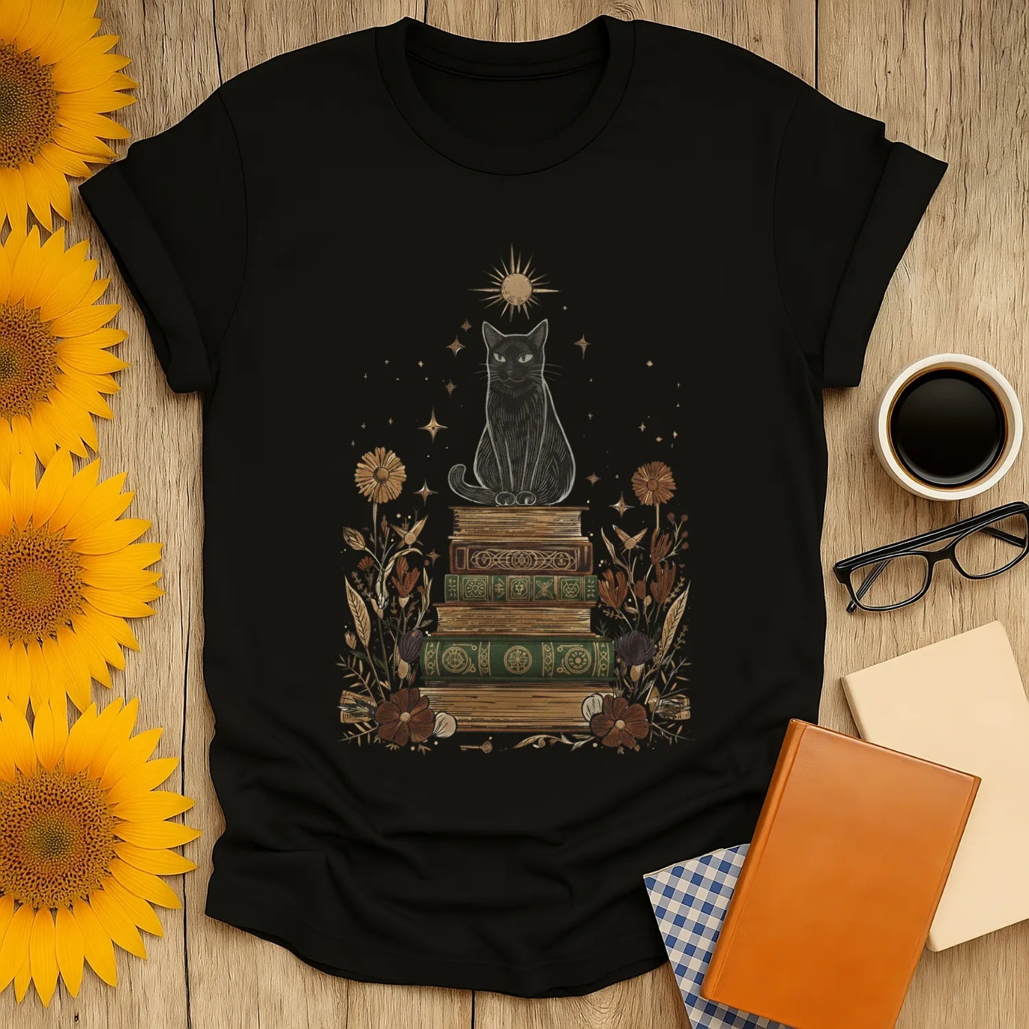 Mystic Cat & Books T-Shirt featuring a magical black cat atop vintage books, perfect for book lovers who adore cozy reading vibes.