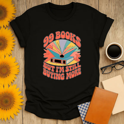 99 Books shirt featuring colorful text and graphic, perfect for book lovers who enjoy cozy reads with coffee or tea.