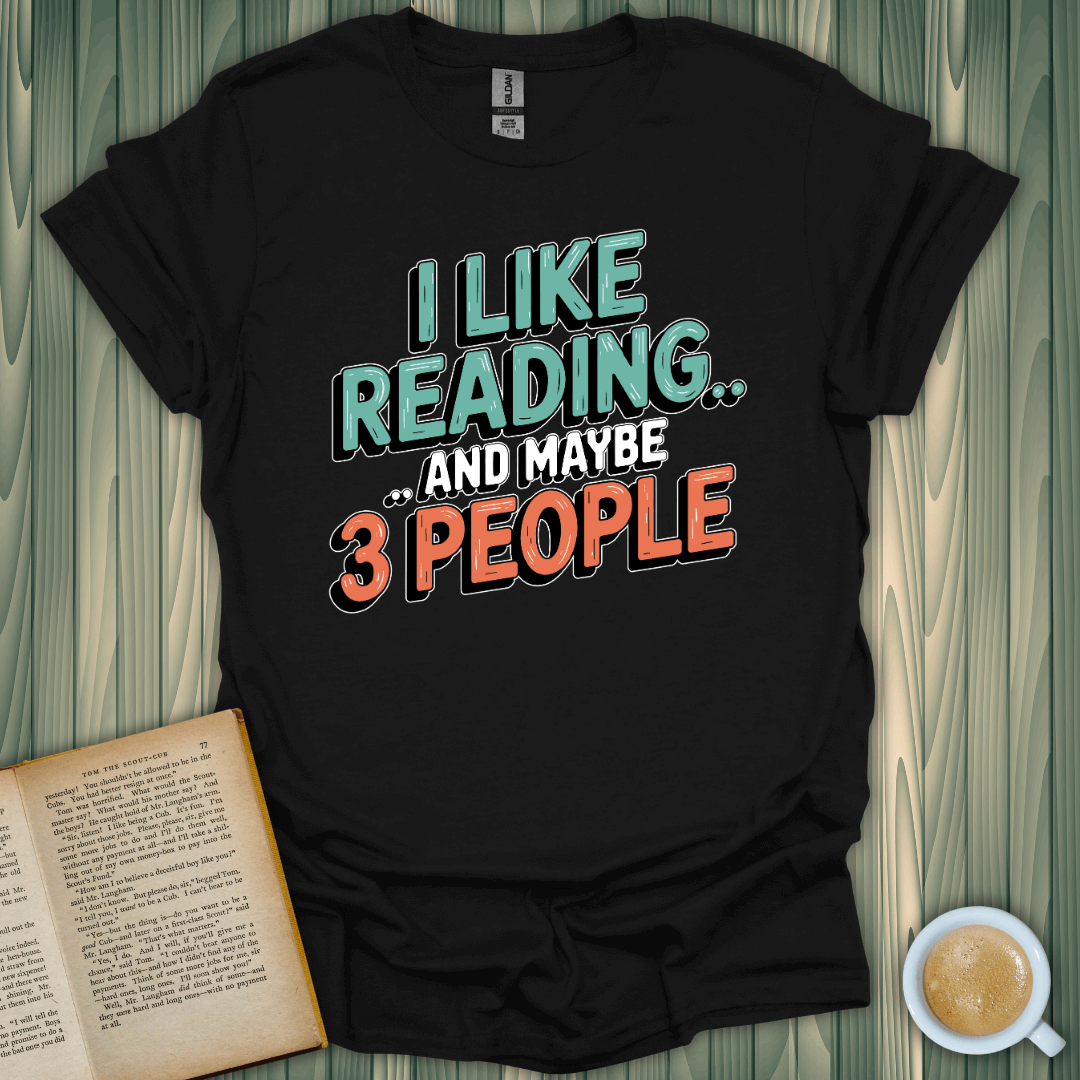 Black T-shirt with 'I Like Reading and Maybe 3 People' design, perfect for book lovers. 100% ring-spun cotton.