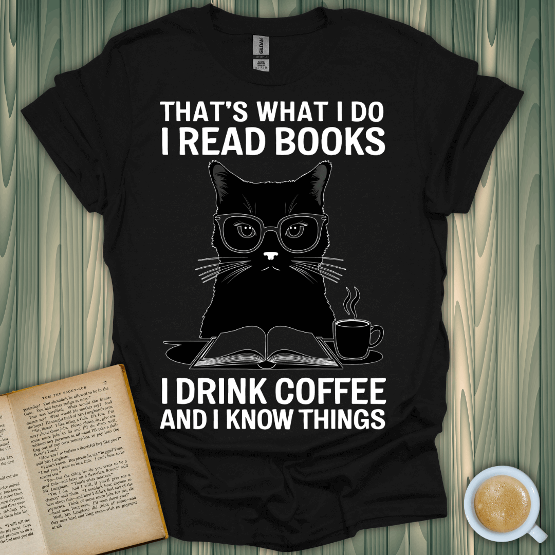 Coffee & Cat Wisdom T-Shirt featuring a stylish cat in glasses, perfect for book lovers who enjoy reading and coffee.