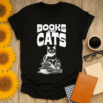 Books & Cats Club T-Shirt featuring a cute cat on book stacks, perfect for book lovers and cozy days with coffee or tea.