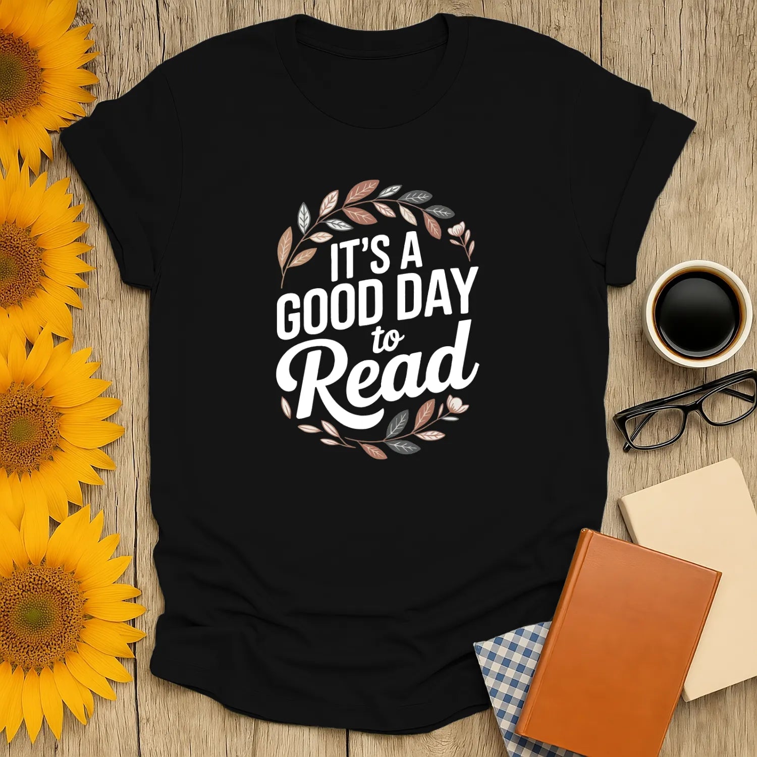 Cozy book lover shirt featuring 'It's a Good Day to Read' with a leafy design, perfect gift for bookworms and tea lovers!