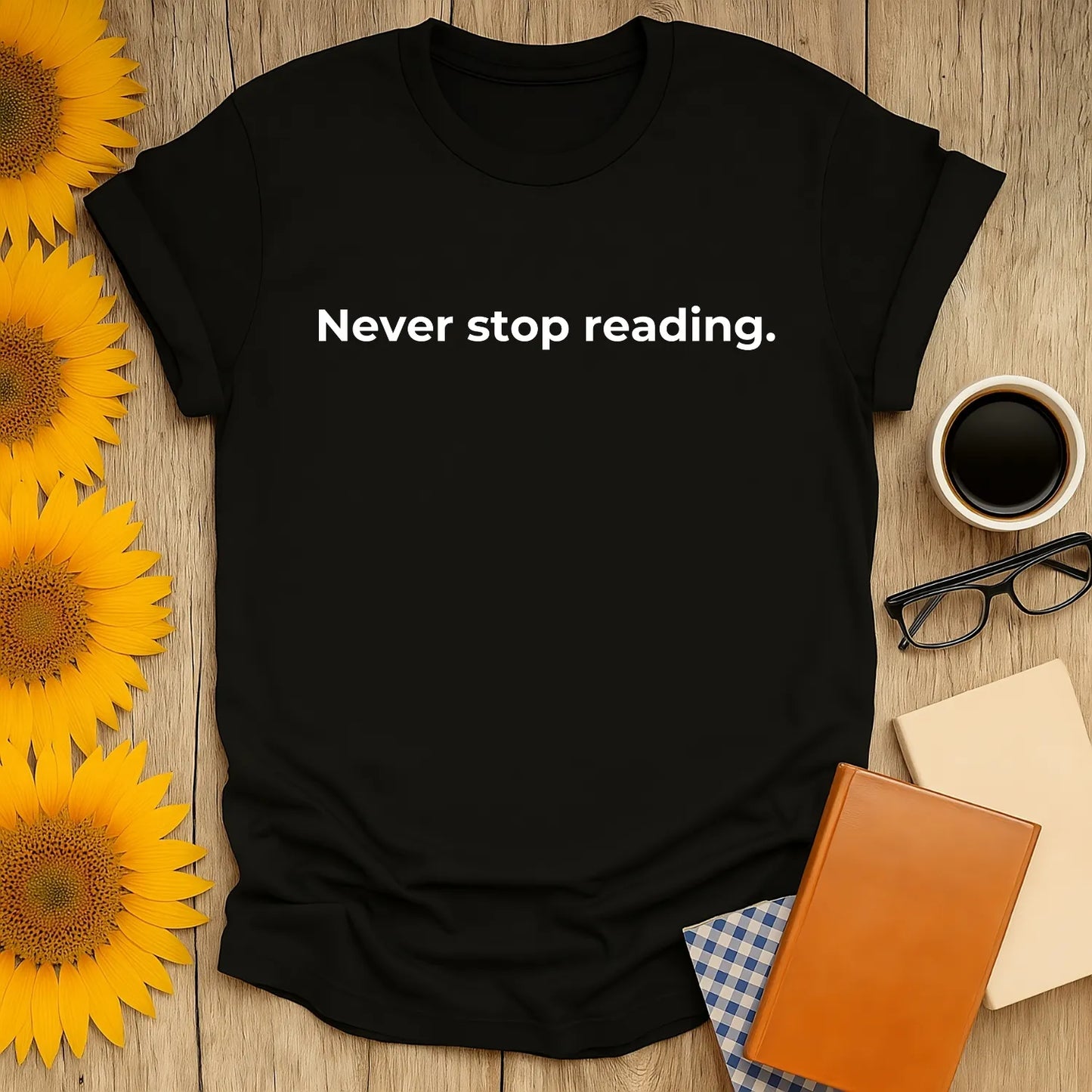 Never Stop Reading T-Shirt with bold text on a black shirt, perfect for cozy book lovers and cat coffee enthusiasts.