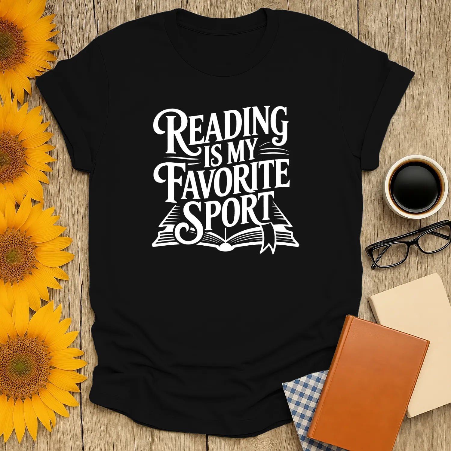 Cozy bookish athlete t-shirt with 'Reading is My Favorite Sport' text, perfect for cat-loving readers enjoying coffee or tea.