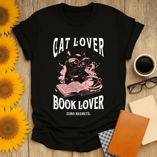 Cat & Book Lover T-Shirt featuring a cool cat in glasses with an open book and coffee, perfect for book lovers and cozy vibes.
