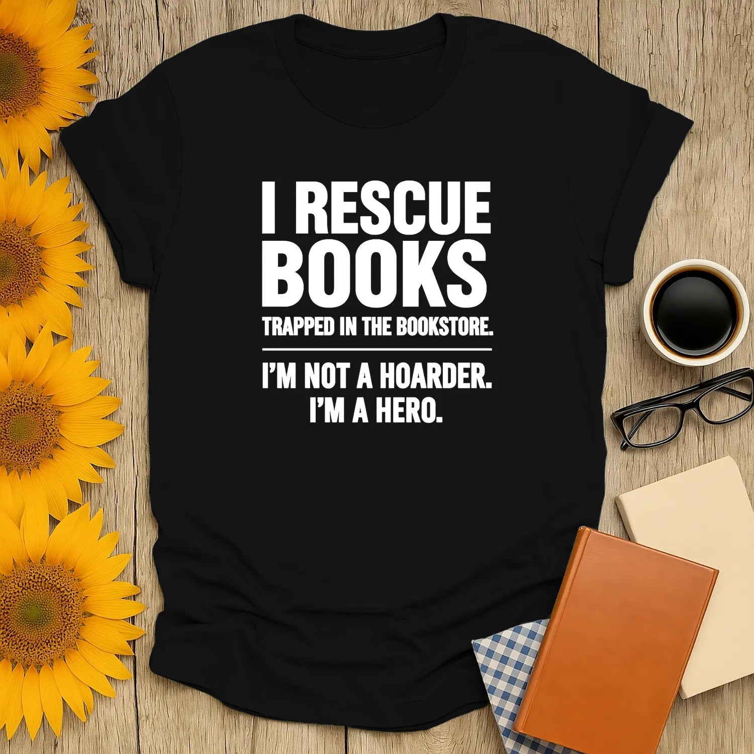 Funny t-shirt for book lovers: 'I Rescue Books' with witty text, perfect for cozy reading, cat, coffee, and tea enthusiasts.