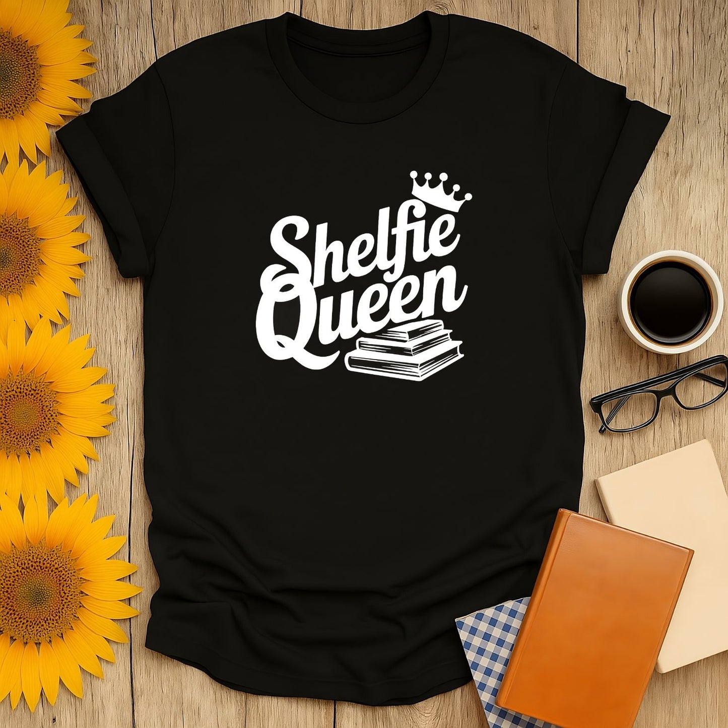 Cozy book lover shirt says 'Shelfie Queen' with books and a crown, perfect for readers who adore cats, coffee, or tea.