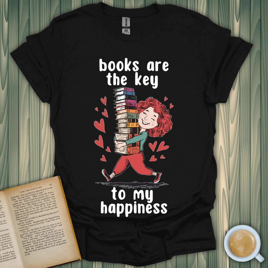 Key to My Joy T-Shirt for book lovers featuring a cheerful character holding stacked books, perfect for casual wear.