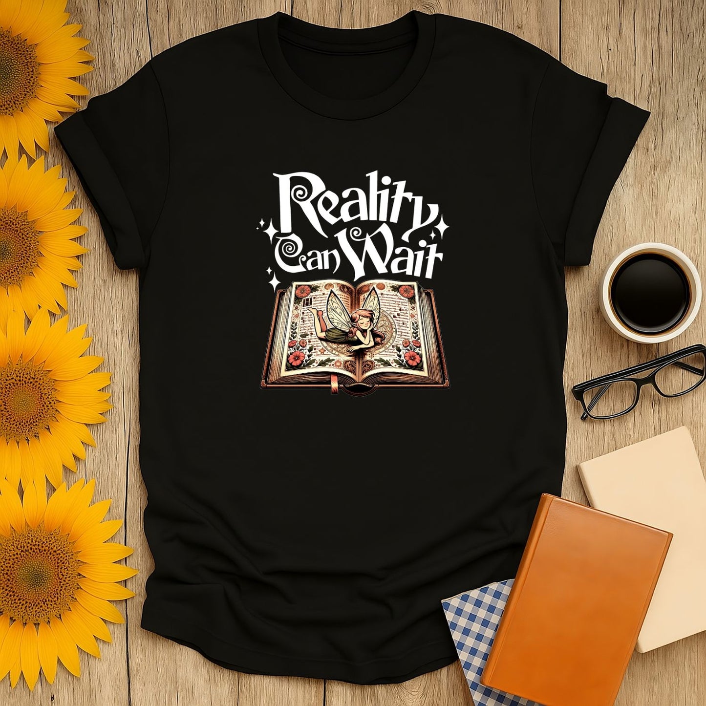 Reality Can Wait T-Shirt featuring an open book and whimsical text, perfect gift for book lovers who cherish cozy reading moments.