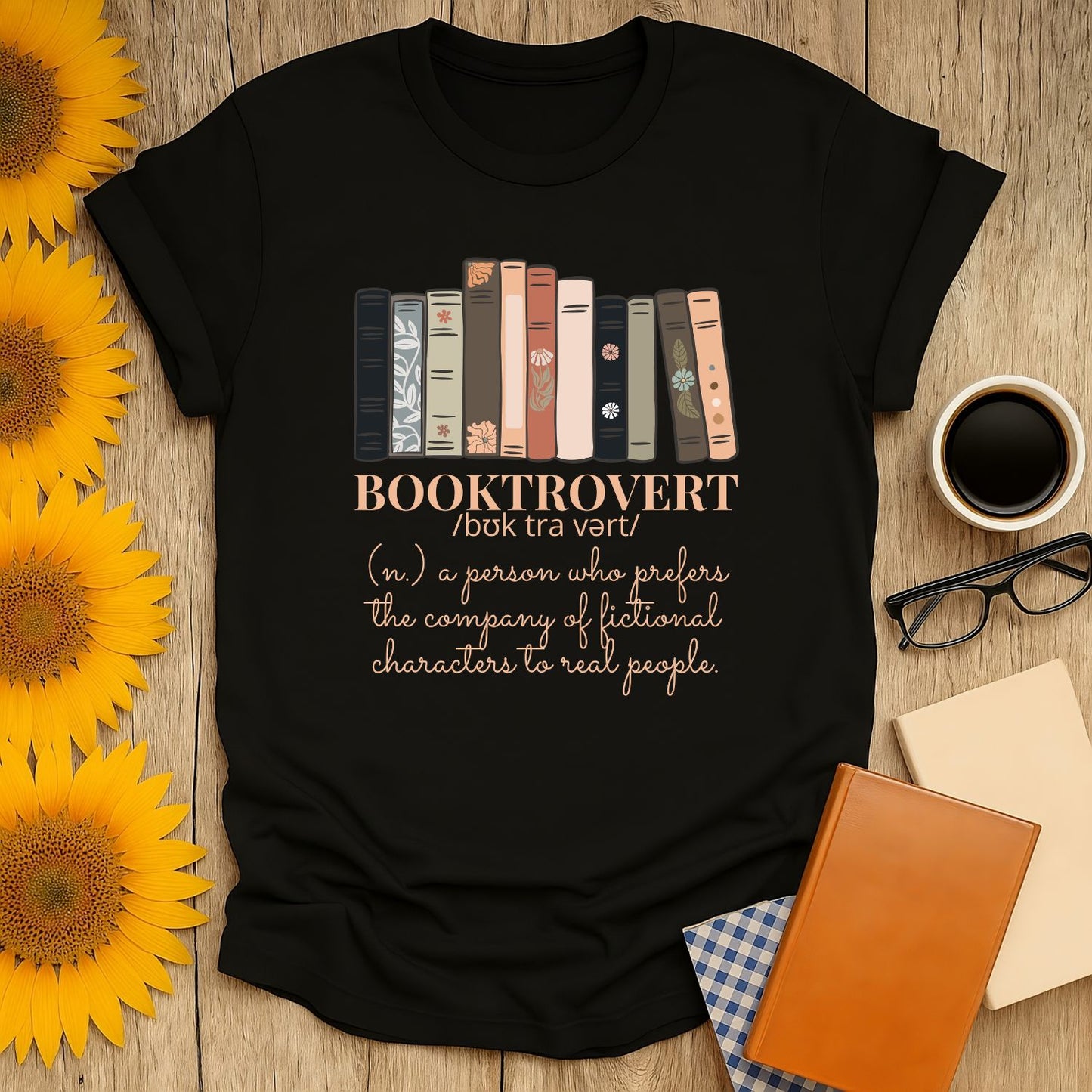 Booktrovert shirt featuring stacked books and a witty definition, perfect gift for book lovers, cozy reading tee.