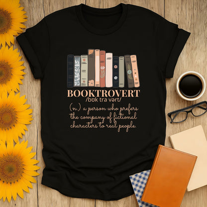 Booktrovert shirt featuring stacked books and a witty definition, perfect gift for book lovers, cozy reading tee.