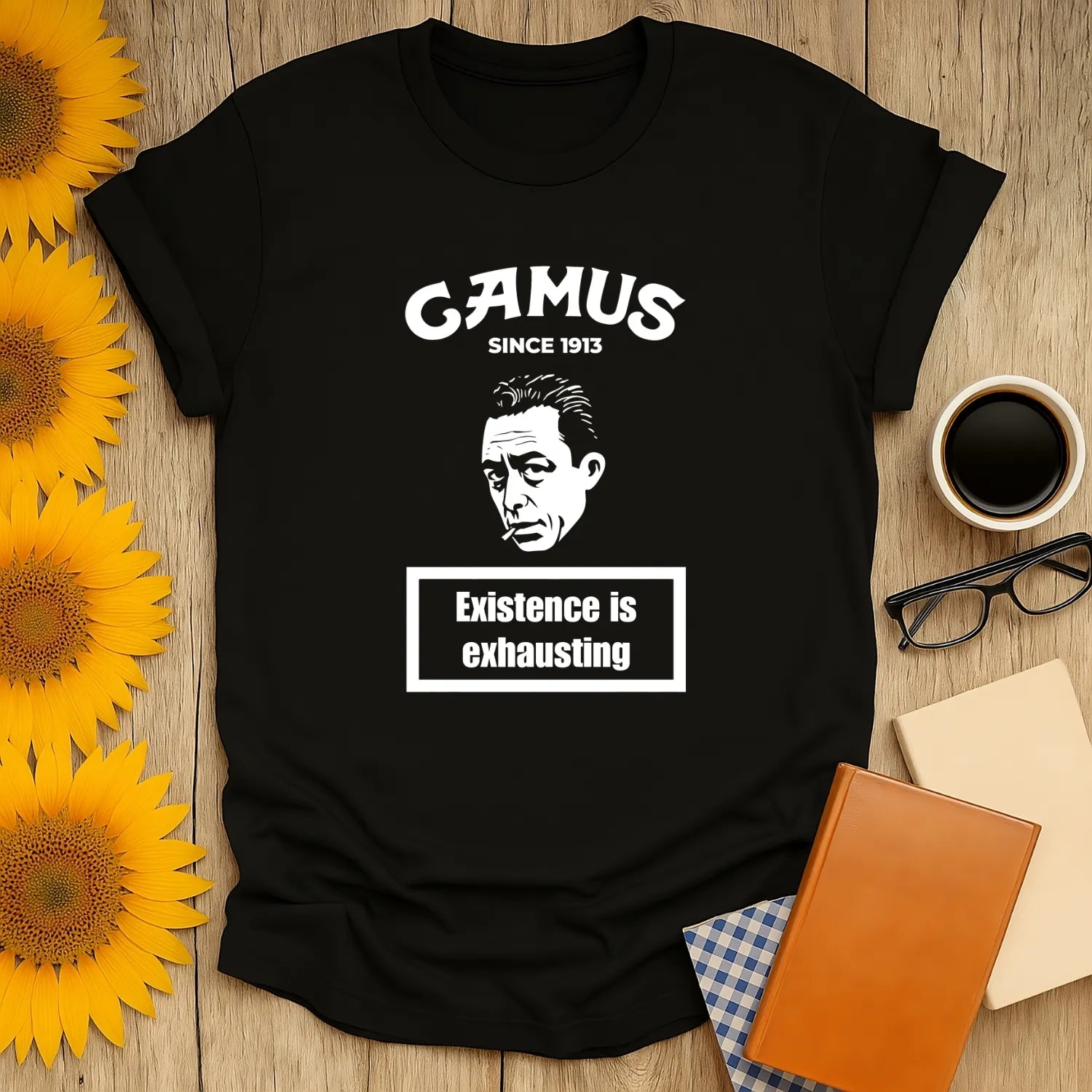Camus Energy Level T-Shirt featuring the quote 'Existence is exhausting' with a vintage illustration. Perfect for book lovers!