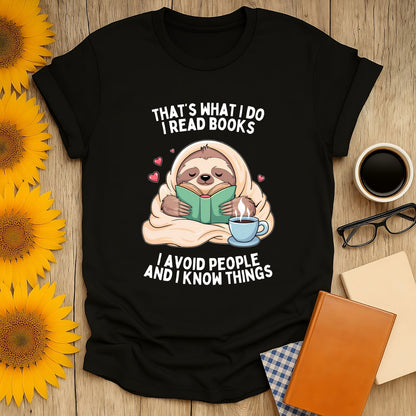 Book lover t-shirt featuring a sloth reading with text: 'That's what I do I read books, I avoid people and I know things.'