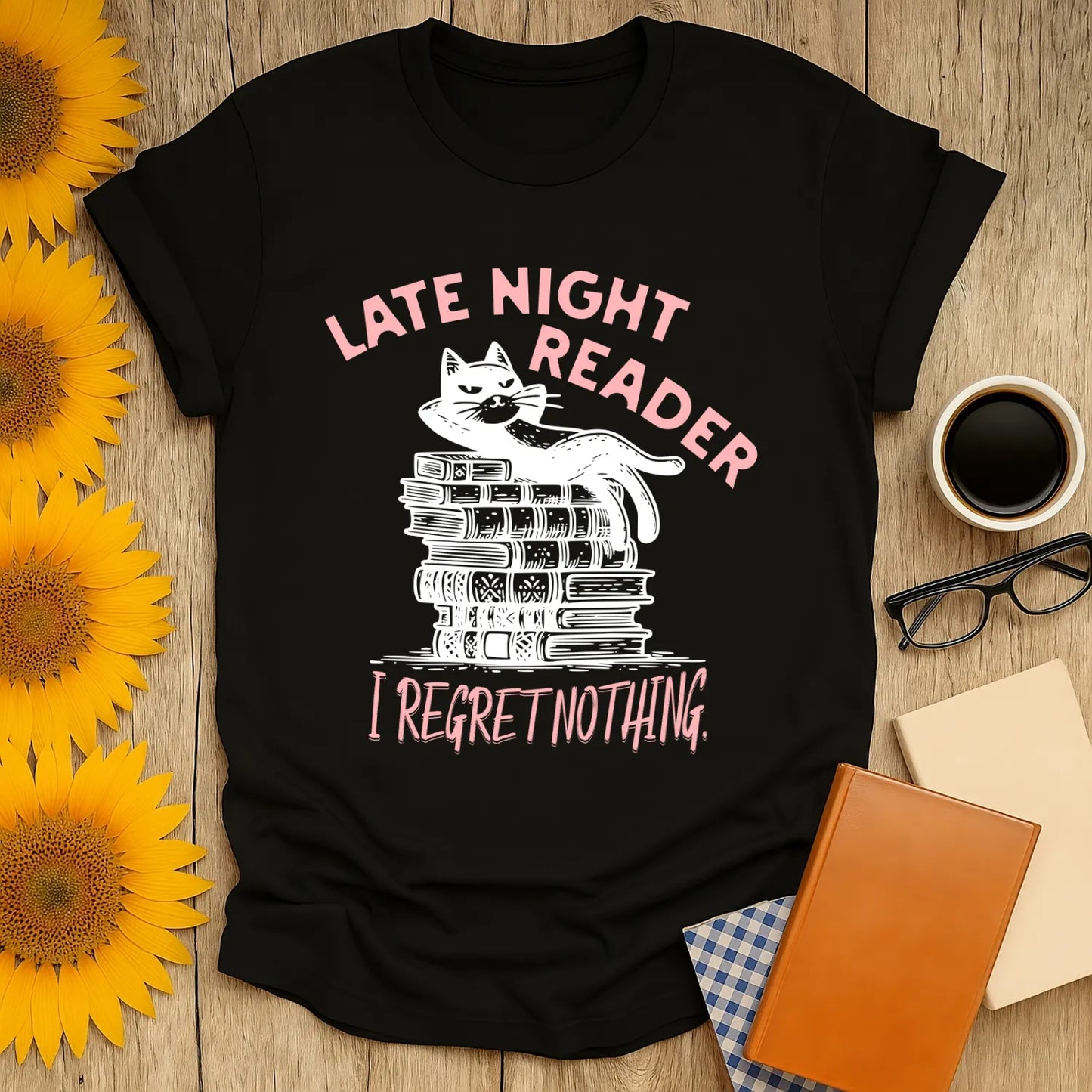 Late Night Reader T-Shirt featuring a lounging cat on books and the text 'I Regret Nothing', perfect for book lovers.