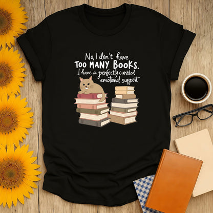 Funny reading tee featuring a cat with books and text: "No, I don't have too many books. I have emotional support."