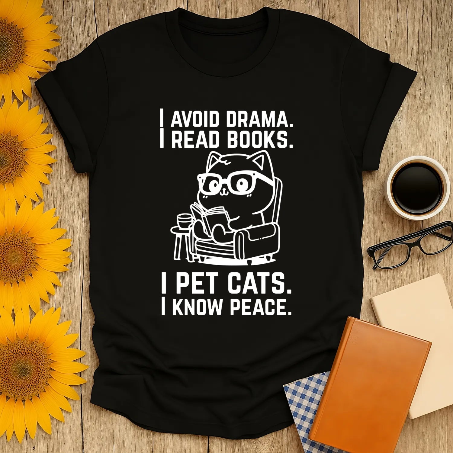 Funny cat reading shirt with illustration of a cat in glasses saying 'I avoid drama. I read books. I pet cats. I know peace.'
