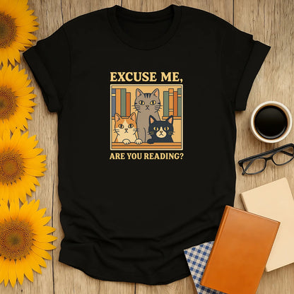 Funny cat reading shirt with three curious cats asking, 'Excuse me, are you reading?' Perfect for book lovers and cozy reading.