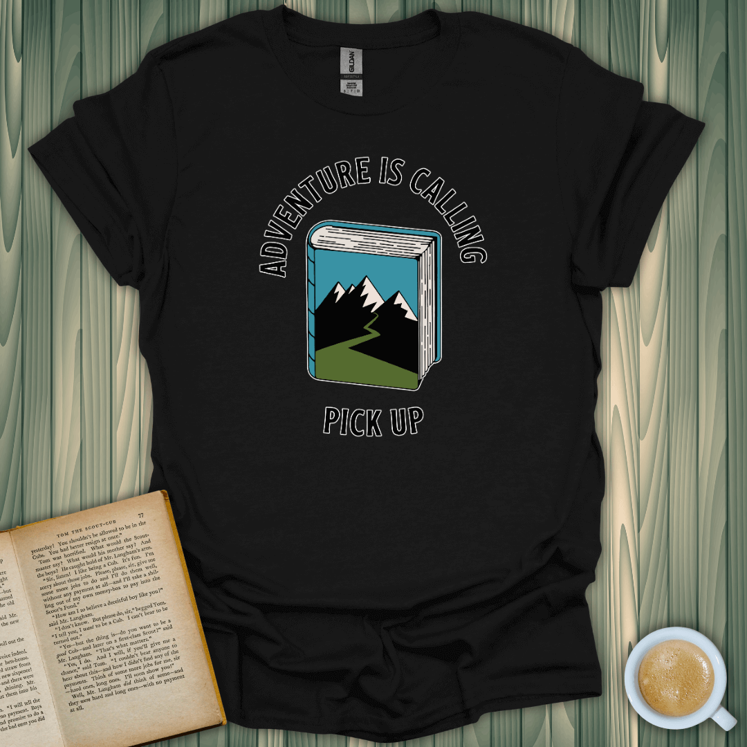 Adventure is Calling T-Shirt in black, perfect for book lovers. Made from breathable cotton, ideal for cozy reads and outdoor adventures.