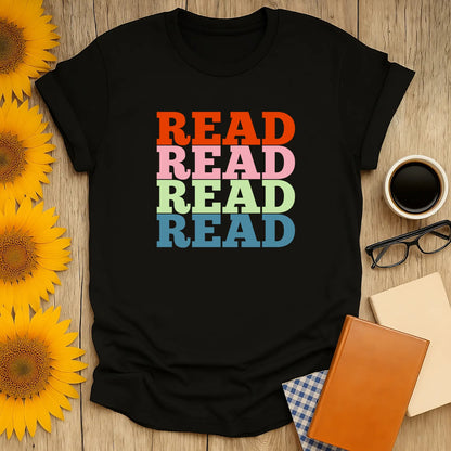 Read It Again T-Shirt featuring colorful stacked typography, a relaxed fit unisex design perfect for book lovers 📖.