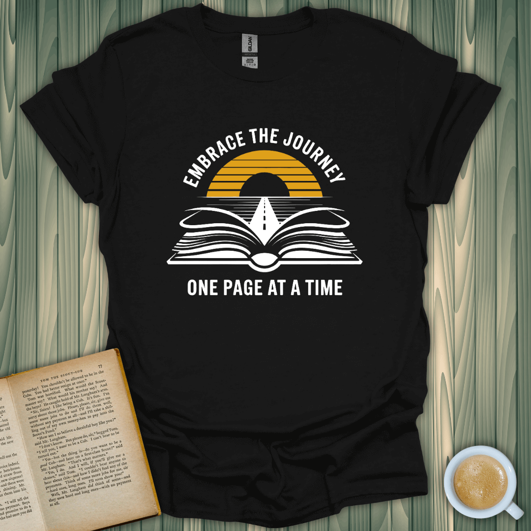 Embrace The Journey T-Shirt for book lovers featuring a vintage book and sunset design.