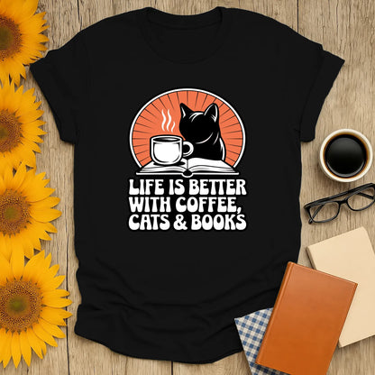 Funny reading tee featuring a black cat, coffee cup, and text ‘Life is better with coffee, cats & books’—perfect for book lovers!