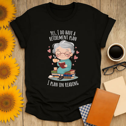 Funny retirement reading tee featuring a cute grandma with a book, hearts & text: 'I plan on reading' - perfect for book lovers!