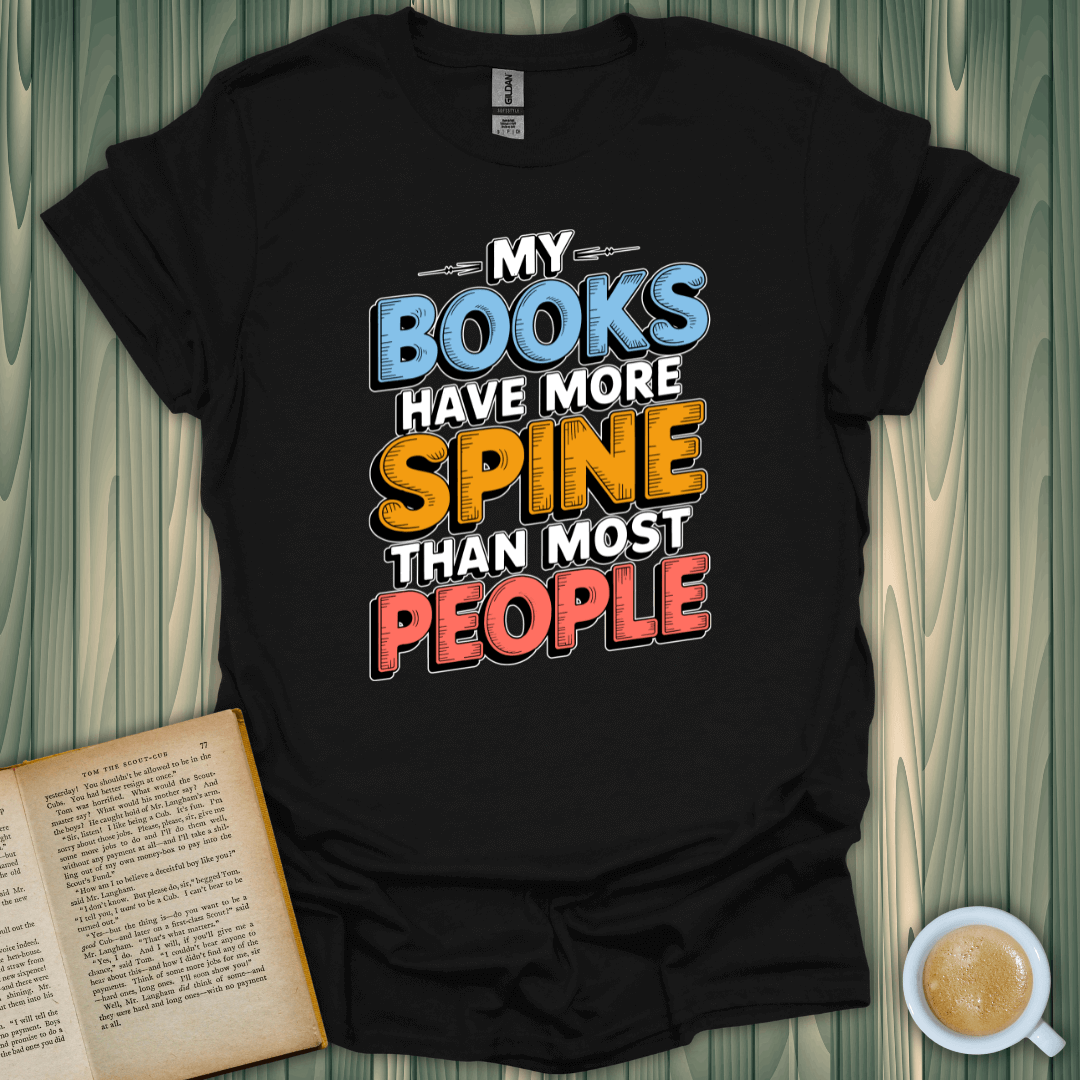 Black unisex T-shirt with colorful text reading 'My Books Have More Spine Than Most People,' perfect for book lovers.