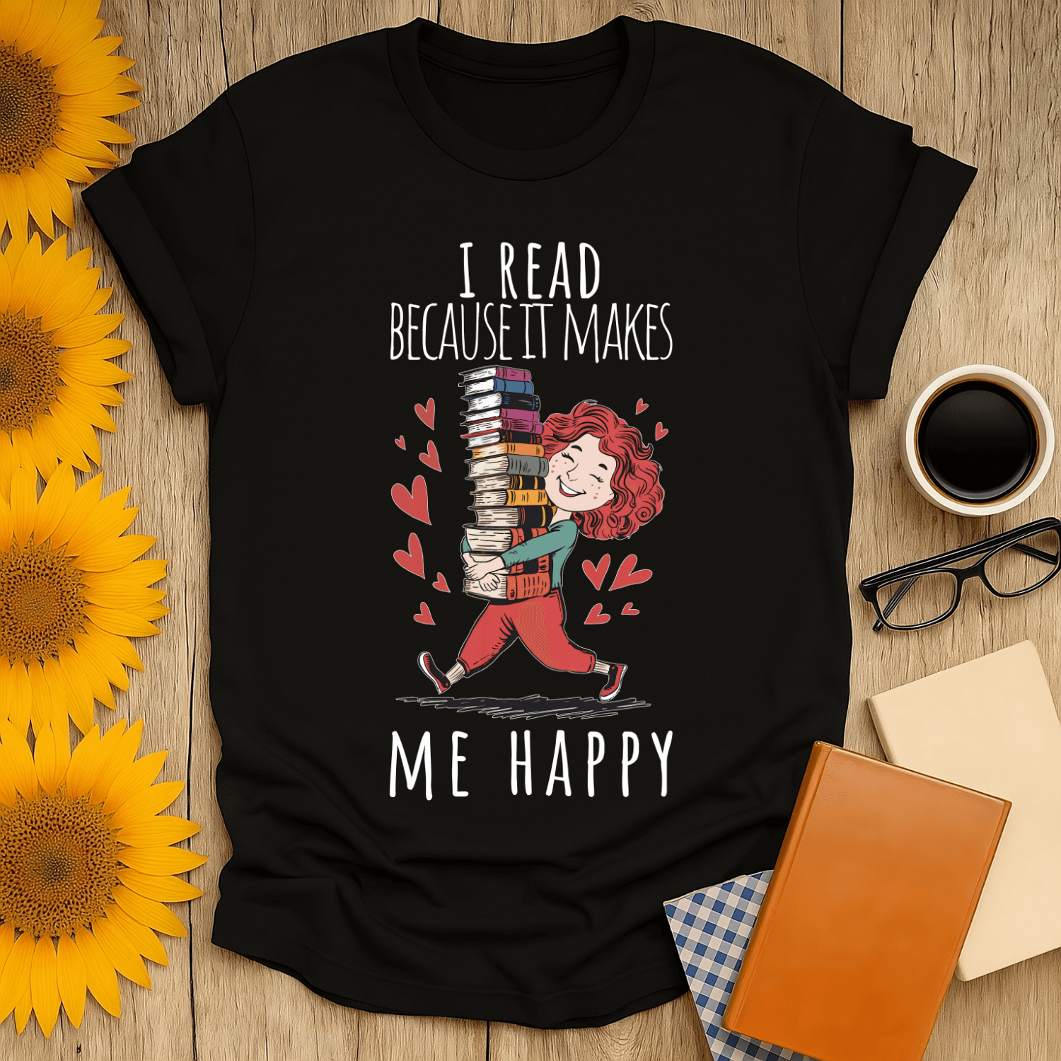 Book lover t-shirt featuring a child joyfully carrying a stack of books with the text 'I read because it makes me happy'.