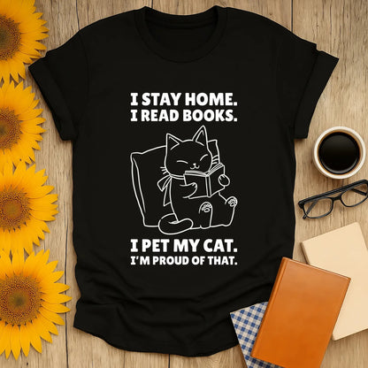 Funny cat reading shirt with text: 'I stay home. I read books. I pet my cat. I'm proud of that.' Perfect gift for book lovers.