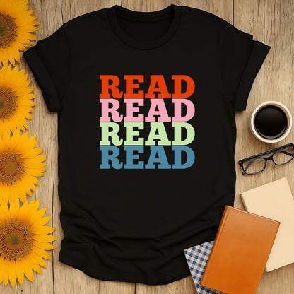 Colorful 'READ' graphic tee for book lovers, perfect cozy gift for cat, coffee, or tea enthusiasts. A fun literary statement shirt!